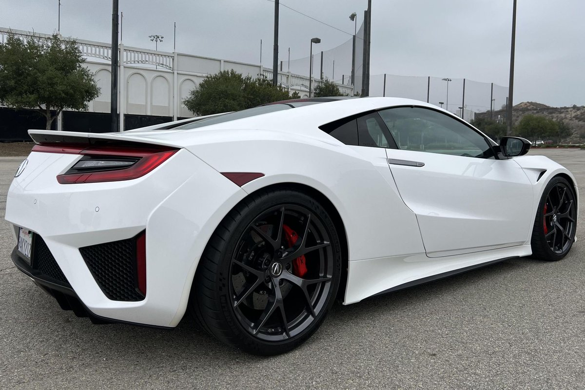 carsandbids's tweet photo. "The second-generation Acura NSX is arguably one of the most underrated supercars on the market, featuring head-turning looks, amazing performance, and impressive handling" - @DougDeMuro 

THIS... is a 2017 Acura NSX, finished in 130R White!

https://t.co/lvAqC9Xir9 https://t.co/CxsR4WFzK5