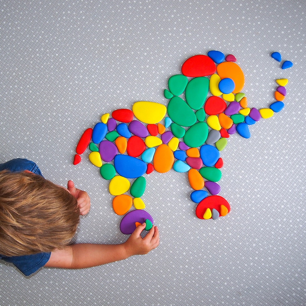edxeducation's tweet photo. We love to play and learn with Rainbow Pebbles®, this is a favourite photo of Elmer the elephant with the Pebbles. What is your favourite book? #playlearncreate #edxeducation #steamtoys https://t.co/6XXwxfJfZa