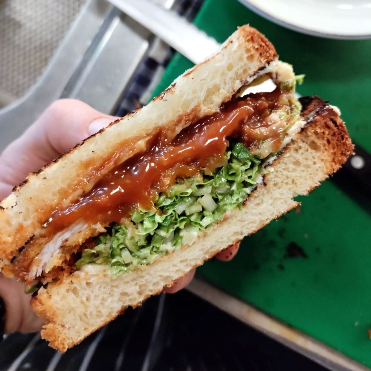 Special sandwich for lunch today: Tonkatsu crispy pork loin, shredded Napa cabbage, &amp; yuzu dressing

My first sandwich on the <a href="/JuniorsDeliCafe/">Juniors Restaurant</a> menu!