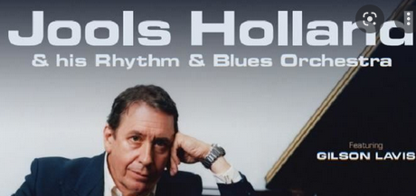 Jools Holland looks *thrilled* to be touring again.