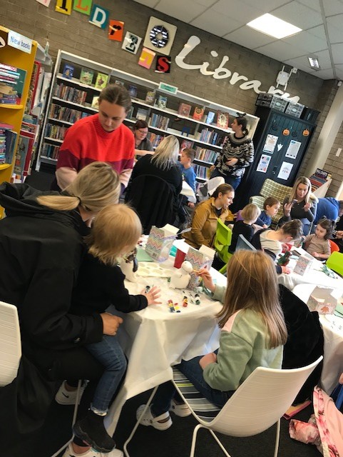 Families attending our ceramic dinosaur painting event at Cadishead library had a roaring time on Monday.