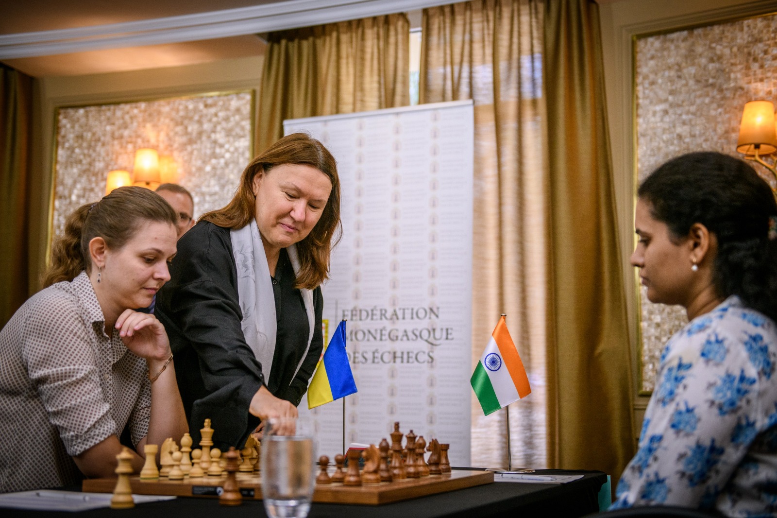 International Chess Federation on X: Louis Starck, General Manager of the  Hermitage Hotel (@MonteCarloSBM), and Inna Bazhenova, publisher of  @TheArtNewspaper Group, made the ceremonial first moves today for Mariya  and Anna Muzychuk
