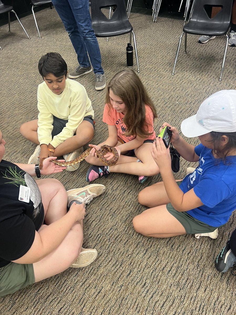 Students are always excited to hold a snake at Rock Eagle. <a href="/SweetAppleES/">Sweet Apple Elem</a>