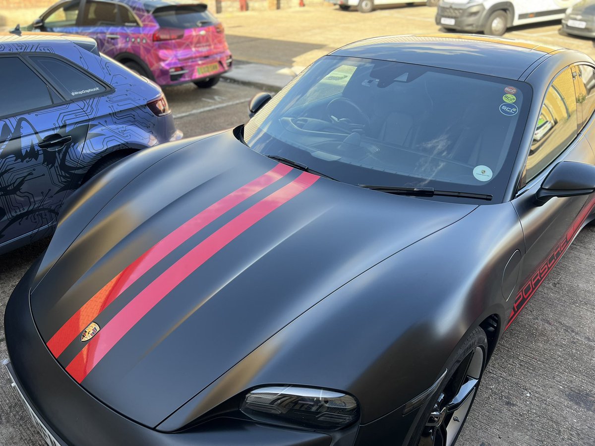 Matte black Porsche wrap. 
#wrappingcars #london #porsche #matte #black #wrap #red #stripes - wrappingcars.co.uk