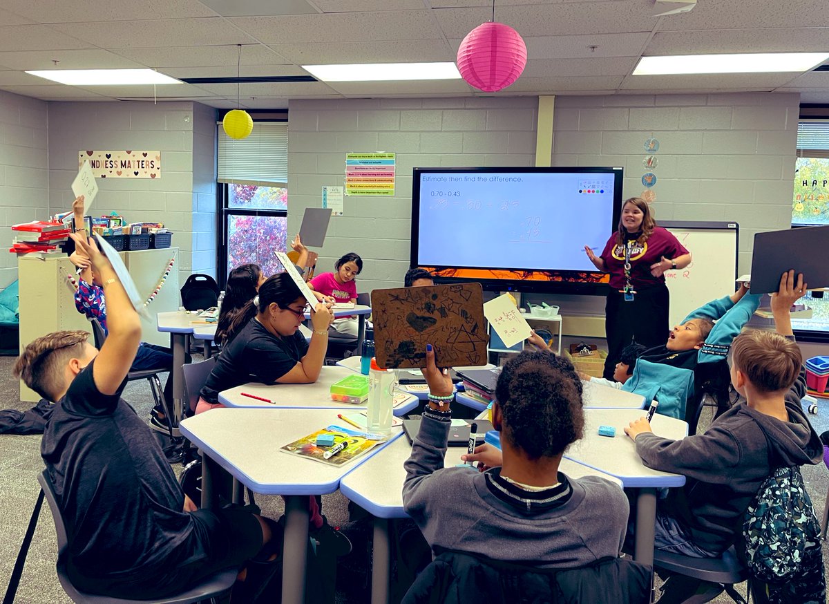 Just hanging out with one of the most amazing 5th grade classes at Muir!  Thank you @MsMcLaughlin54 for letting me come crash your subtracting decimals party.  So fun to see students engaged and excited about MATH! What rockstars!!! #muirmoments #LINEUPtheplacevalue #engaged
