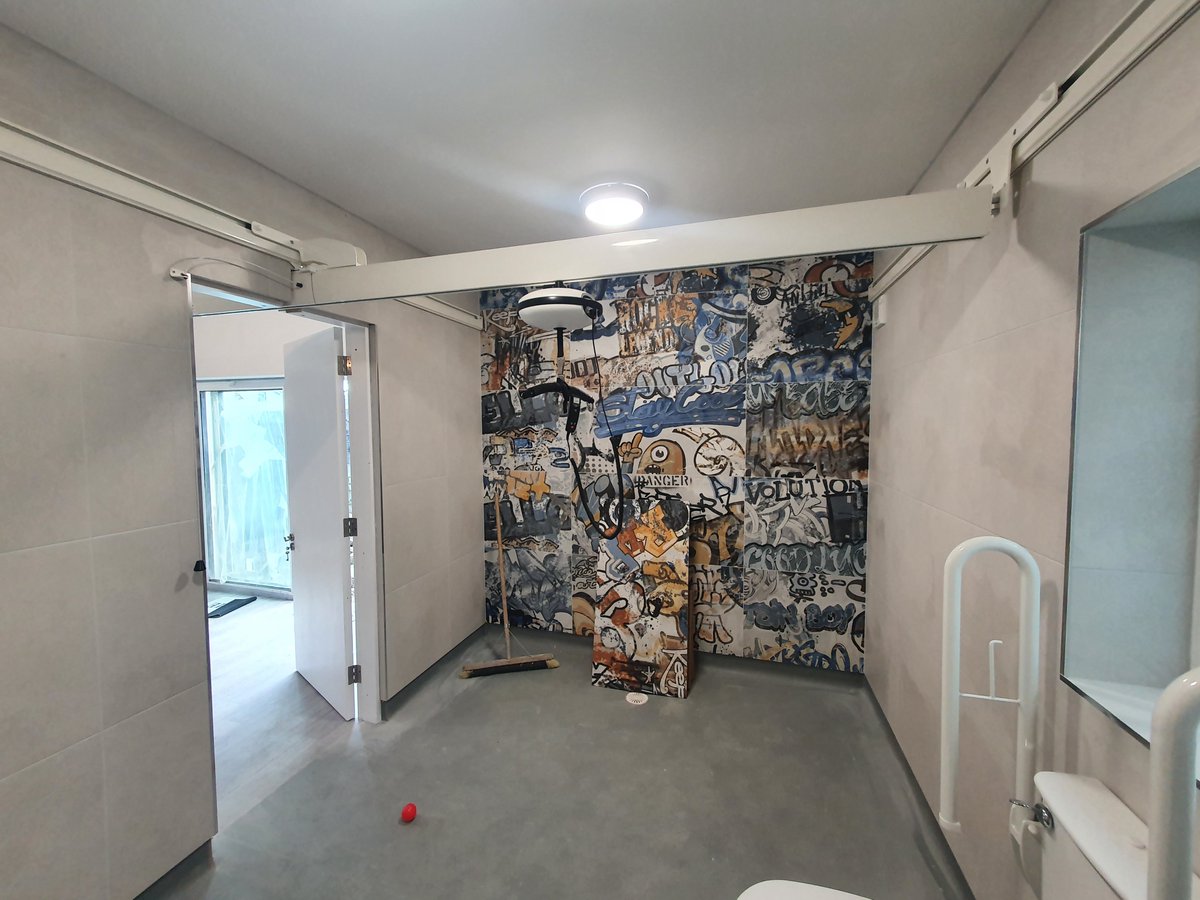 EliteHealthcare's tweet photo. We installed our Luna #overheadhoist in a house in #Limerick today for a family moving in.  Connected 2 rooms via a door connector.  Love the feature wall in the wc to complement the Luna too, great idea by the family #danishdesign #accessibility https://t.co/zspMIY7VCE