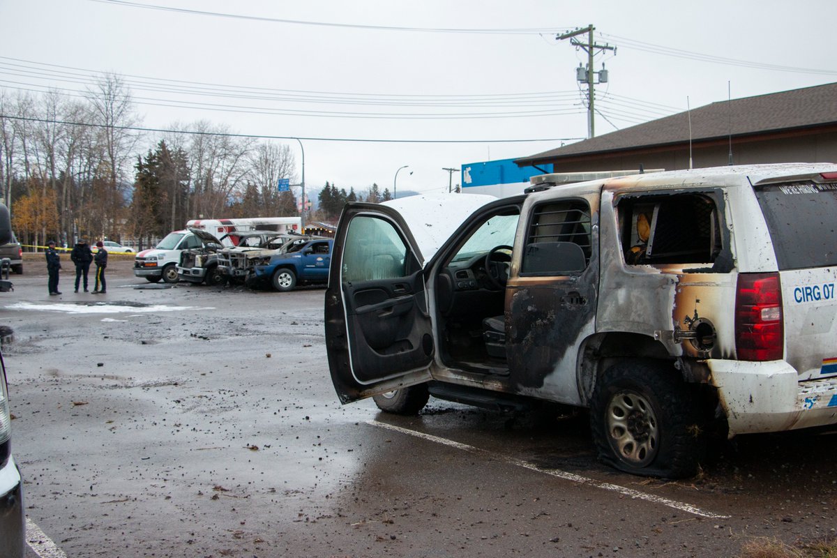 Heavy police presence at a hotel in downtown Smithers right now, where at least eight vehicles — two or more belonging to RCMP's C-IRG unit, which polices the Morice FSR — were burned early this morning.