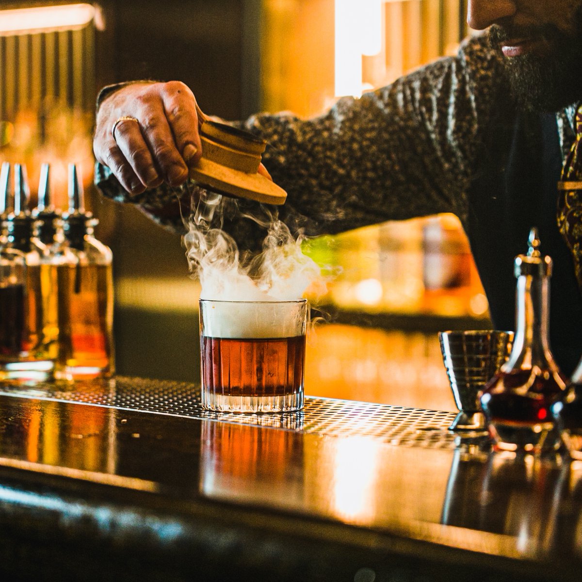 A very layered scandal, filled full of smoke and mirrored surfaces.