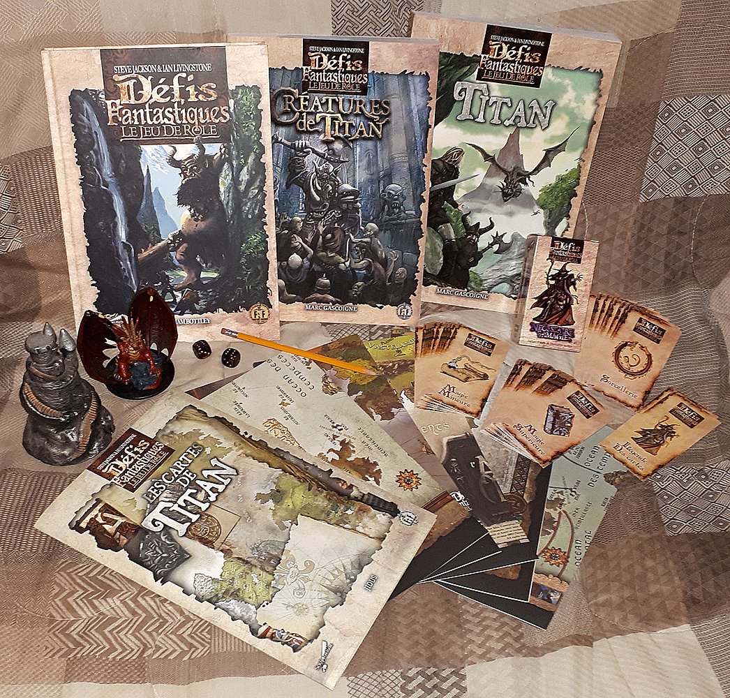 blackshield77's tweet photo. DÉFIS FANTASTIQUES : Le Jeu de Rôle. Ma dernière acquisition. DF : Jeu de Rôle + DF : Créatures de Titan + DF : Titan "Incluant Les Cartes de Titan" + Nécessaire de Magie. #defisfantastiques #fightingfantasy #ttrpg #rpg #jdr #ldvelh #gamingbook #scriptarium #gallimard #jeuderole https://t.co/zg7nxVmL31