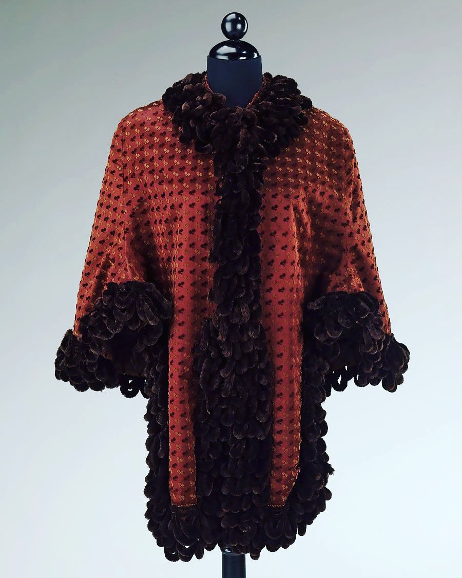 My winter ready purchase is an electric shawl that looks a little bit like this late #1880s velvet dolman. This wrap is trimmed with fat loops of brown chenille, aptly in this case the French word for caterpillar. Snuggle ready…… @metmuseum #fashionhistory