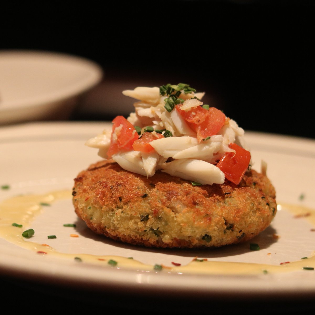 Our favorite cake is made with juicy lump crab meat! 🦀