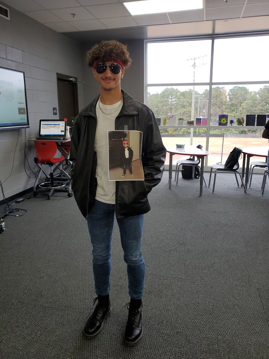 Weaver High, Senior Week. Today was Send Your Senior Back to Kindergarten Day.

This is Jalen Barnwell showcasing a picture of himself wearing the same attire in Kindergarten. Precious!