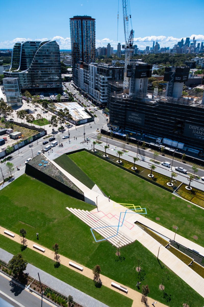 cityofsydney's tweet photo. We’ve opened a new park in the heart of Green Square. With expansive lawns, barbecues, public art, and a wetland to cleanse stormwater, the new Drying Green will become a backyard for many people living in one Sydney's busiest neighbourhoods. Learn more: https://t.co/CiZ19jxBUa https://t.co/otNicswVjJ