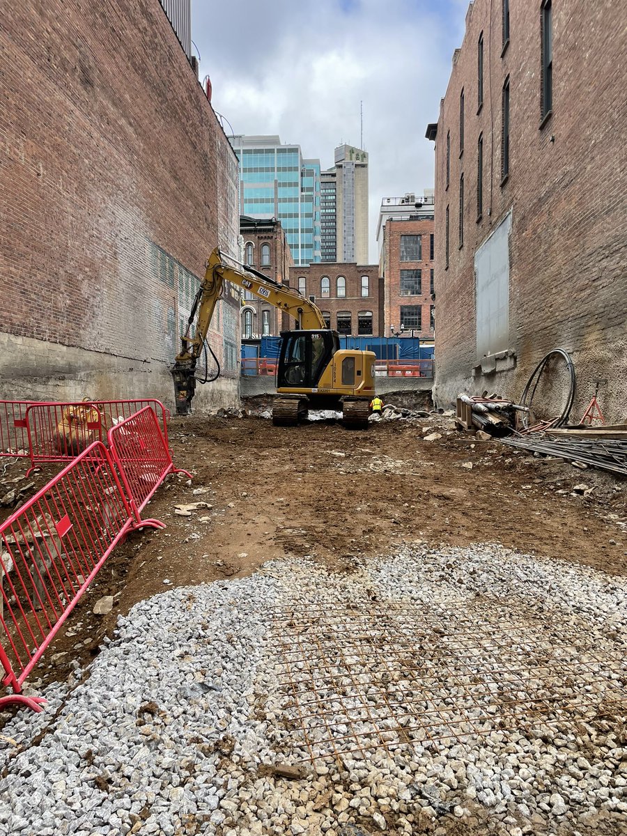 lizabeththeiss's tweet photo. DPR Nashville’s 405 Broadway is making progress. Shout out to the Ragan Smith team as we work to their civil engineering plans for excavation. This is a view not many will see of Lower Broad in Nashville. #Nashville #civilengineering #RaganSmith #CentricArchitecture https://t.co/c53wrLgQCo
