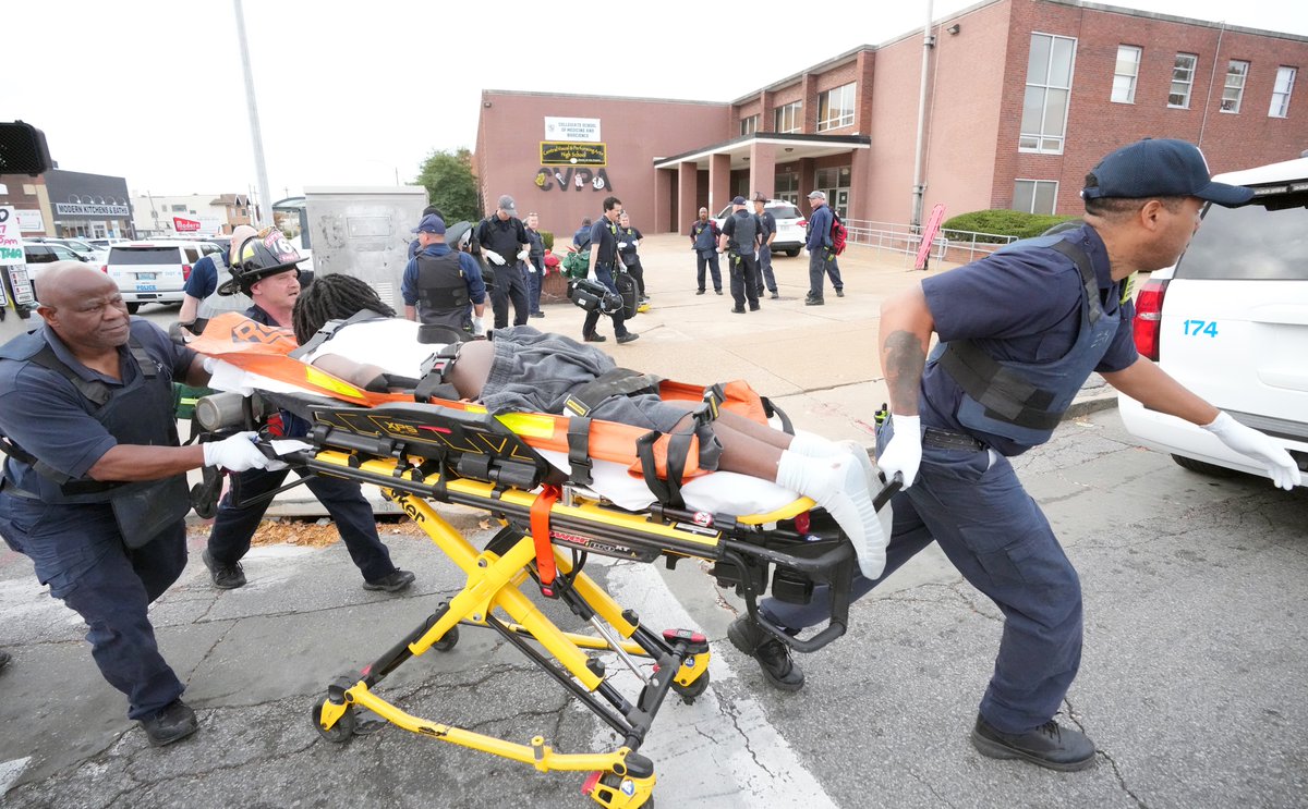 St. Louis firefighters convey a shooting victim to a waiting ambulance during an active shooter situation in the Central Visual and Performing Arts High School in St. Louis on Monday, October 24, 2022. Photo by Bill Greenblatt/UPI