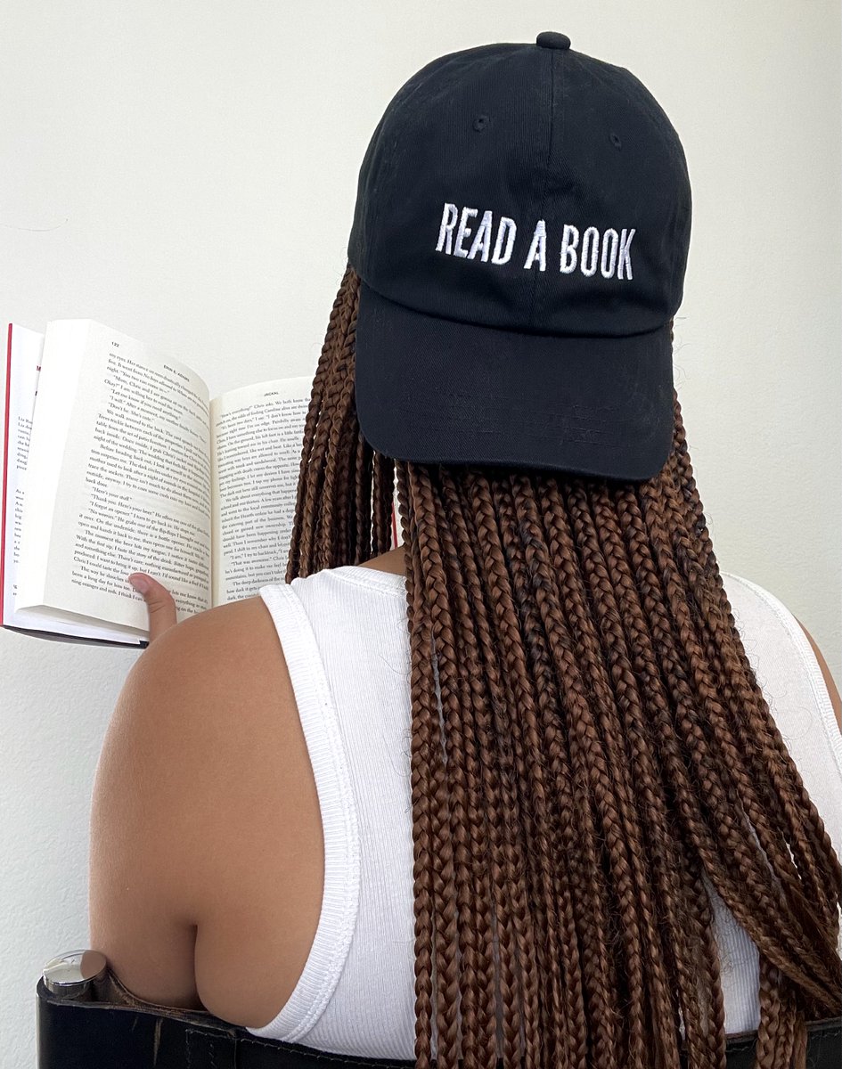 Need a reading reminder? Check out our favorite 'Read a Book' hat, which comes in multiple colors. Use the link in our bio to shop! 📚