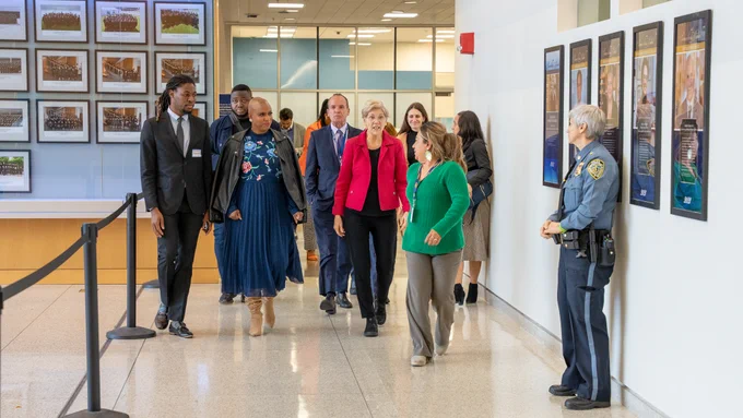 Senator Warren and Congresswoman Pressley walking down the UMass Chan halls