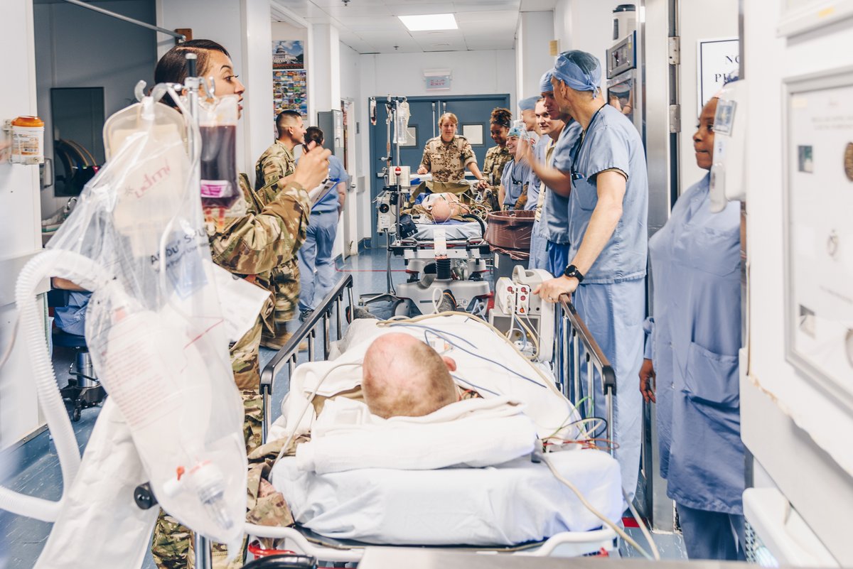 Swannickson's tweet photo. The 455th Expeditionary Medical Group (EMDG) was Afghanistan's only level 1 trauma hospital. This image I took in 2019 represents my brand because it captures what I want to do as a professional photographer, which is to be a full-time photojournalist.  #MCO335 https://t.co/jVsJ05OGPG