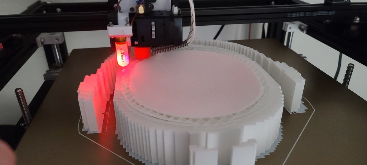 The3DMisprinter's tweet photo. #Mandalorian helmet making thread. 
This one will be a themed helmet for a person that wants it to be a mix of the NFL #Cowboys and Mando helmet. Printing on a modded ender 5 plus with a BIQU H2 extruder. #3dprinting https://t.co/BTcPrJbyRd