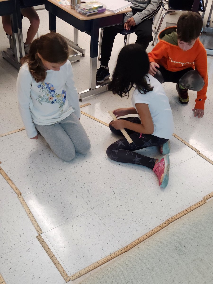 HeatherRedin's tweet photo. When students realize the floor tiles are a square foot and start creating their models to show a rectangle's area on the classroom floor! #wiltonwayct #wpscmsocial @IllustrateMath https://t.co/vlSsxhrQ4X