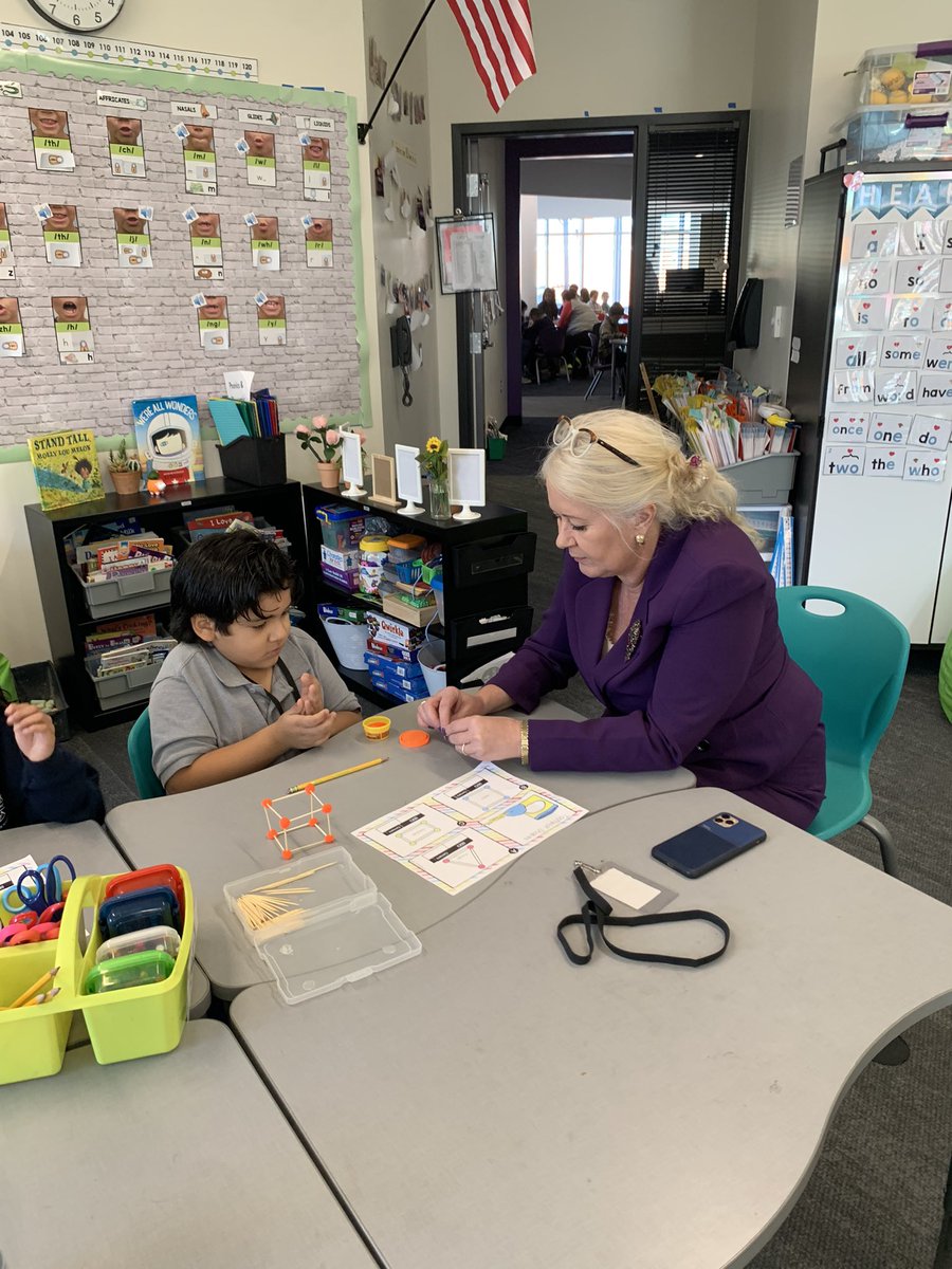 lagosherlock's tweet image. Today, parents came to work alongside their student in a school-wide geometry activity. They stayed for Sherlock Coffee where they also learned to tap out the sounds in words. Our goal is to connect parents with the curriculum, our staff, and other Sherlock families. @D99Cicero