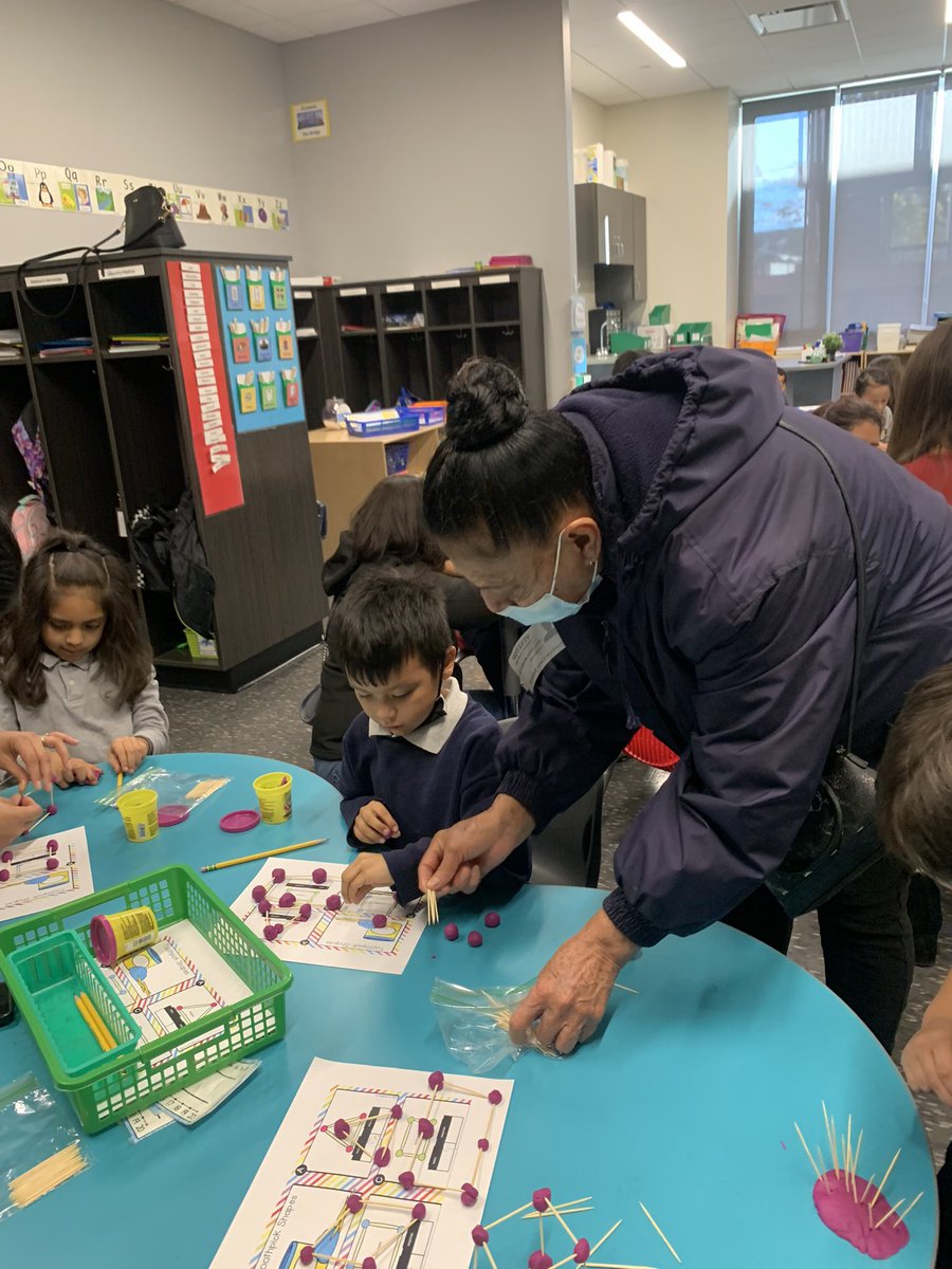 lagosherlock's tweet image. Today, parents came to work alongside their student in a school-wide geometry activity. They stayed for Sherlock Coffee where they also learned to tap out the sounds in words. Our goal is to connect parents with the curriculum, our staff, and other Sherlock families. @D99Cicero