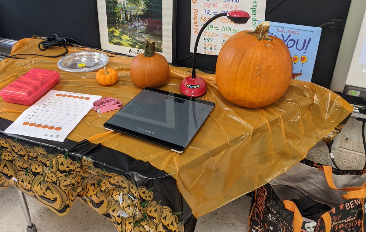 neene's tweet photo. Today a third grade class explored a pumpkin for #PumpkinDataProject. They wrote predictions and recorded factual measurement data. They estimated distances and employed creative problem-solving. We opened the pumpkin under the document camera. #WardTechCafe https://t.co/sOI7JJ3JR2