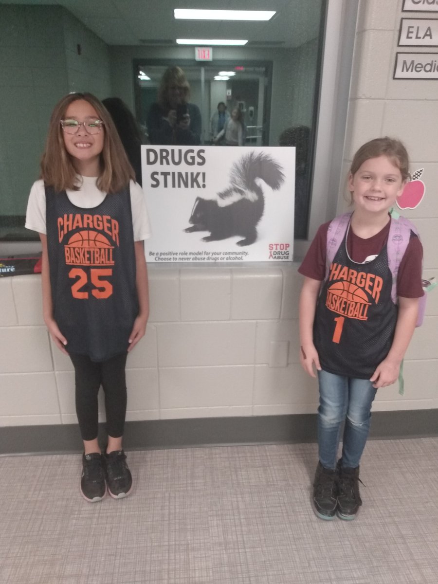 Sugar Creek students showing off Charger jerseys representing heathy hobbies for Red Ribbon Week!