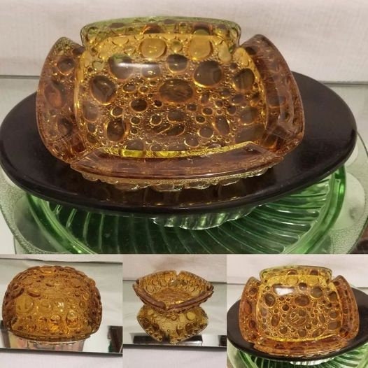 DWedgeCreations's tweet photo. #etsy shop:Blenko Amber Bubble Pebble Ashtray https://t.co/YlNw5zq7M4 #goldglass #newyears #blenkoglass #blenkoashtray #bubbletexture #midcentury #marijuanaashtray #amberglass #cigarashtray #ashtray #artglass #amberblenkoashtray #blenkobubble #trinketdish #art #artware https://t.co/RvYfaW17Pa