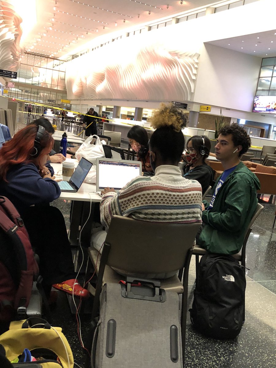UC Davis Research Scholars are hard at work studying at the airport on their way to the SACNAS Conference in Puerto Rico.