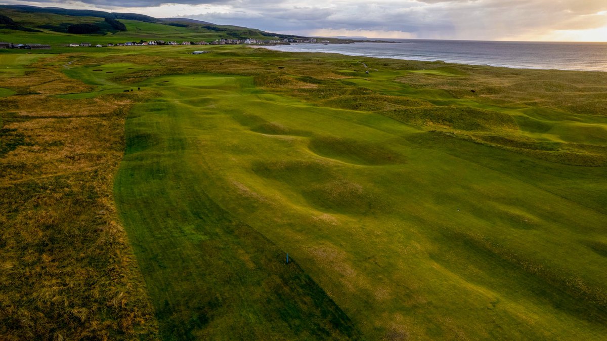The bathtub undulations of the 14th fairway. Often into the prevailing wind, our Stroke Index 1 is a stern test for all.