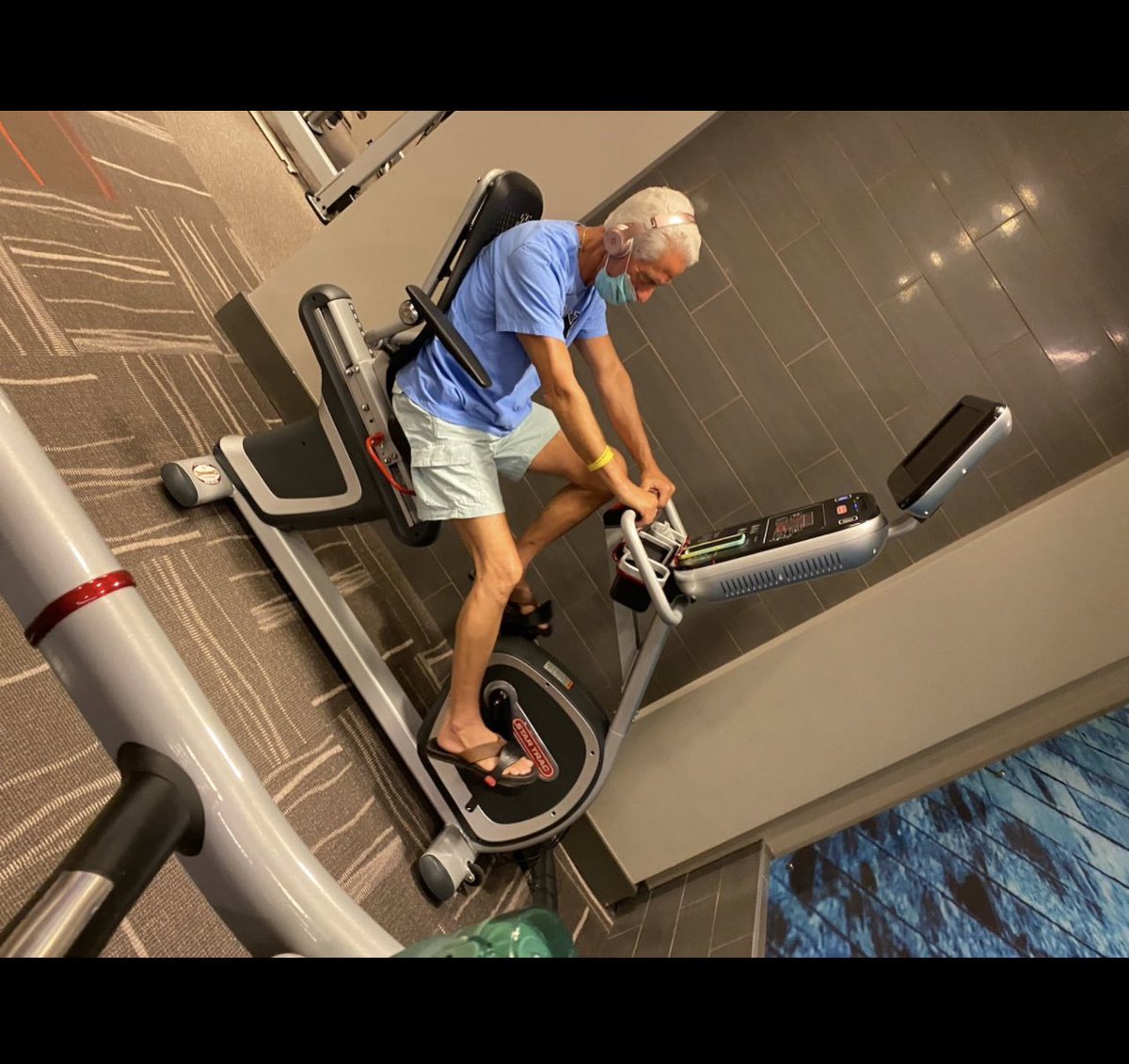 This is Charlie Crist. He wears a mask at the gym.