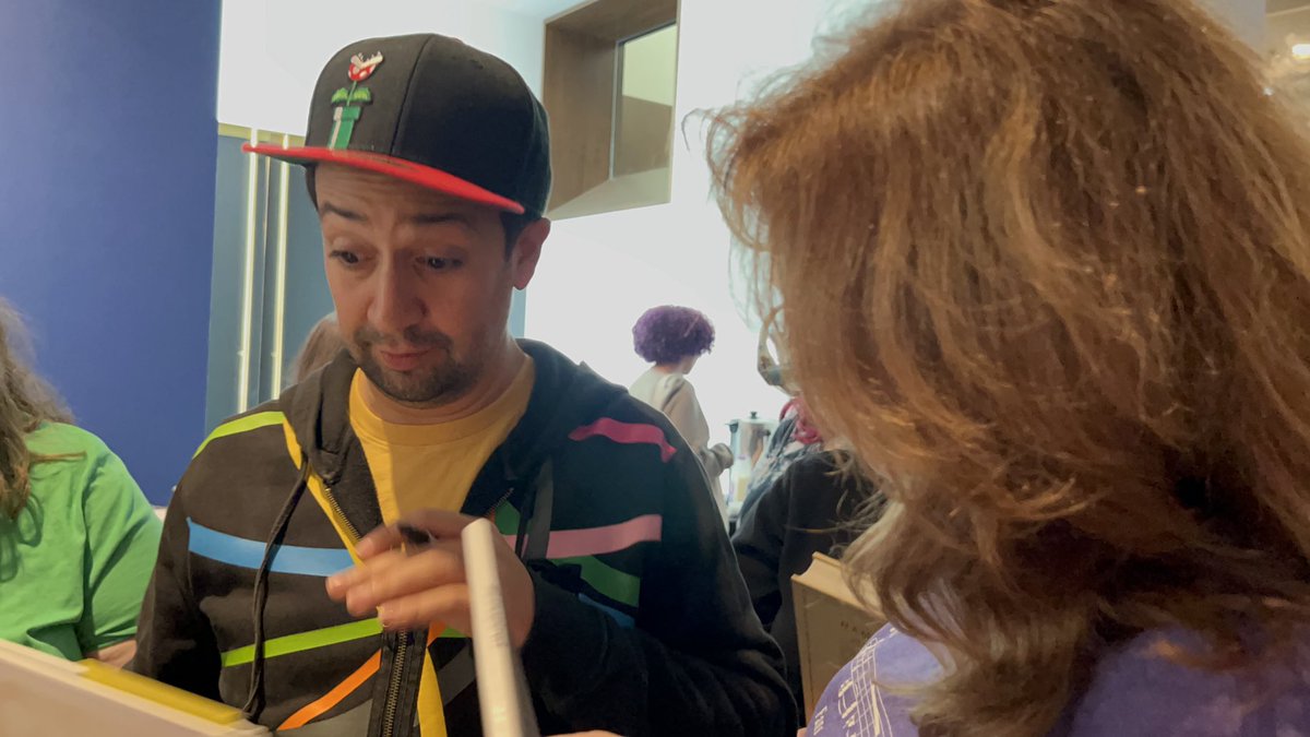 Hamilama's tweet photo. Lin getting the #Linspired book 😁😆 I think that’s a good surprise face @Lin_Manuel @Vegalteno https://t.co/98pDEw3d1S