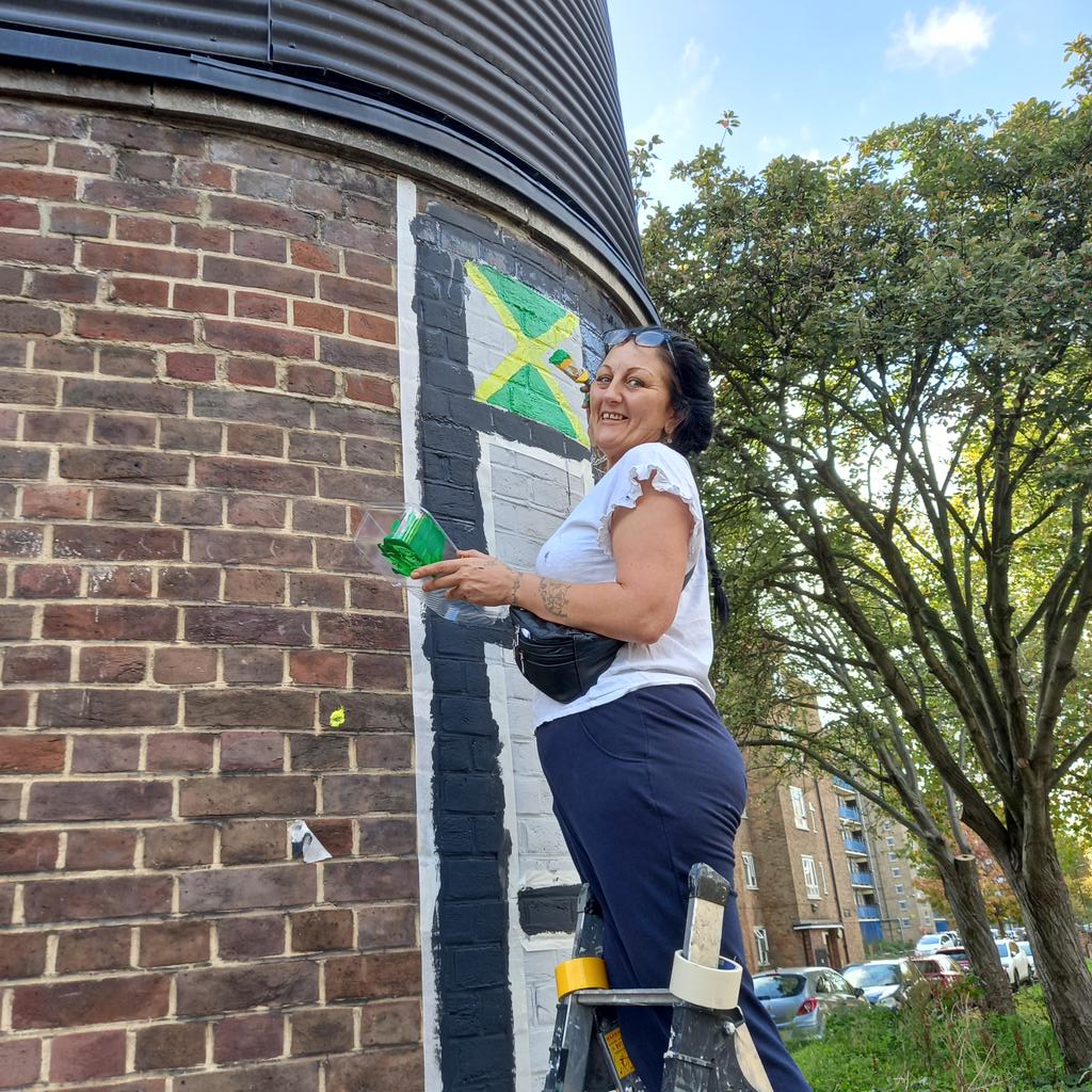 On the way out from my vaccination @ElsdaleCity I meet the tireless @KristaBrownBA painting the mural for #BlackHistorySeason in memory of Dr Colin Franklin.