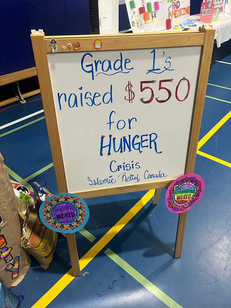 isnaelementary's tweet photo. Islamic Heritage Fall Fair Grade 1's booth was all about humanitarian work and charity. The class also worked hard to collect $550 and donate it towards the Hunger Crisis Appeal with @IRCanada!
#IslamicHeritageMonth #IslamicReliefCanada #IES #ISNAElementarySchool https://t.co/T8U06ms7SA