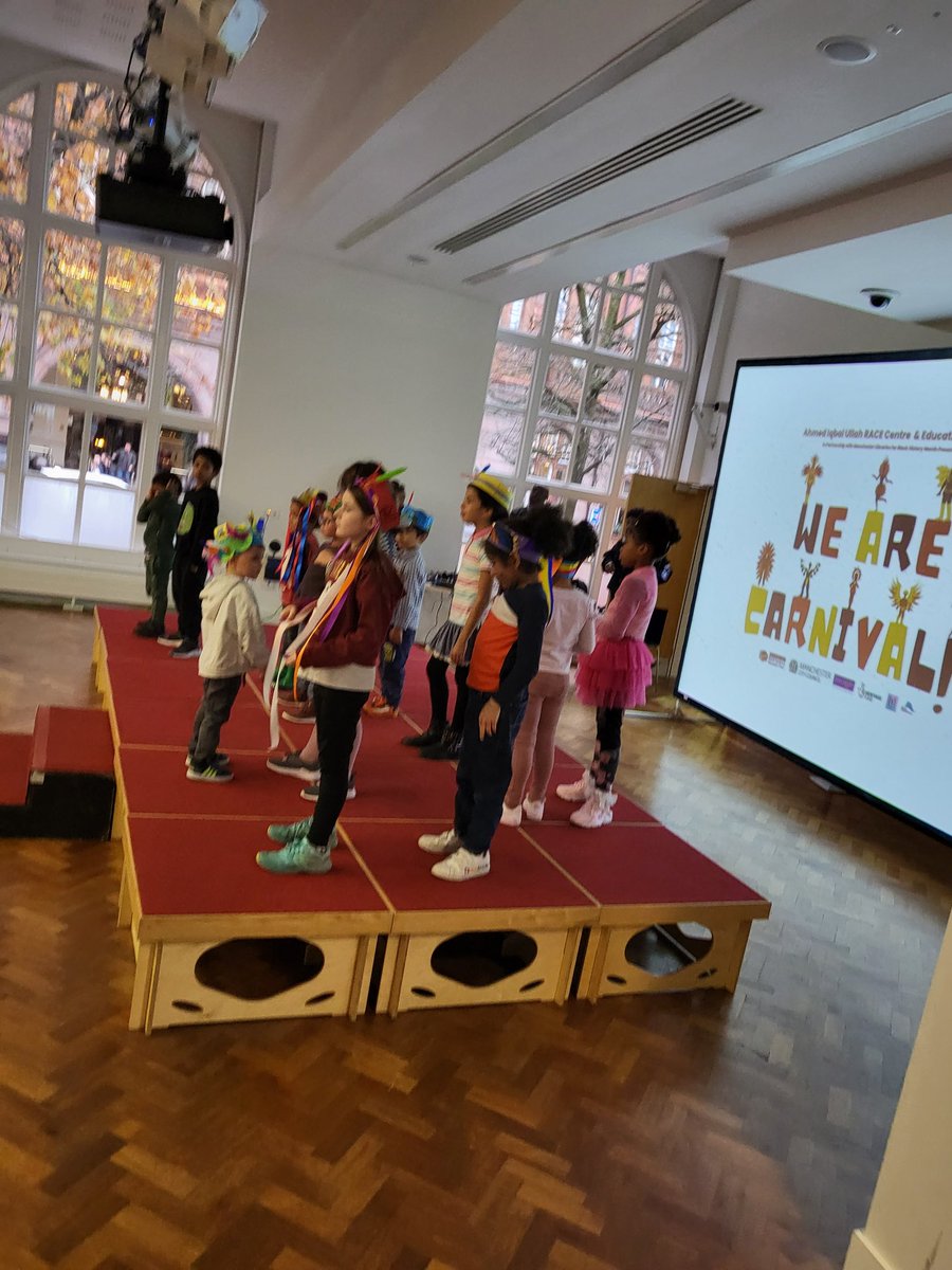 AIUCentre's tweet photo. Full house here in the performance space Central Library with our mini carnival Kings and Queens making and parading #wearecarnival #BHM2022 @archivesplus @ManCityCouncil @manclibraries https://t.co/OEcvRN0Cbn