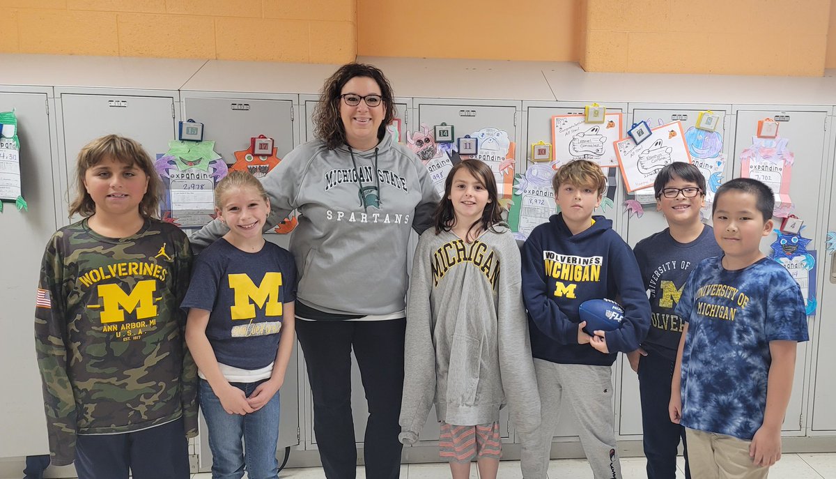 MSU vs U of M spirit day.....here I am with some of my little rivals 💚🤍/💙💛