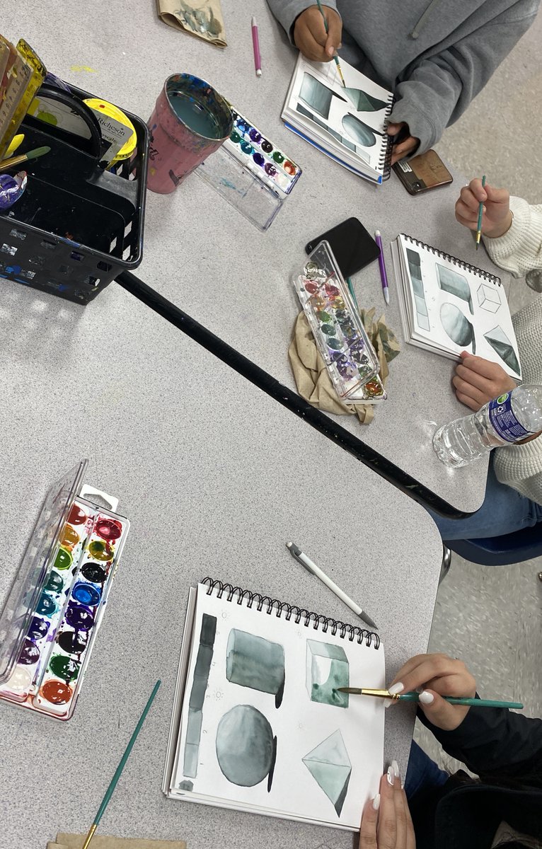Students are learning how to paint highlights and shadows realistically with watercolors today!
