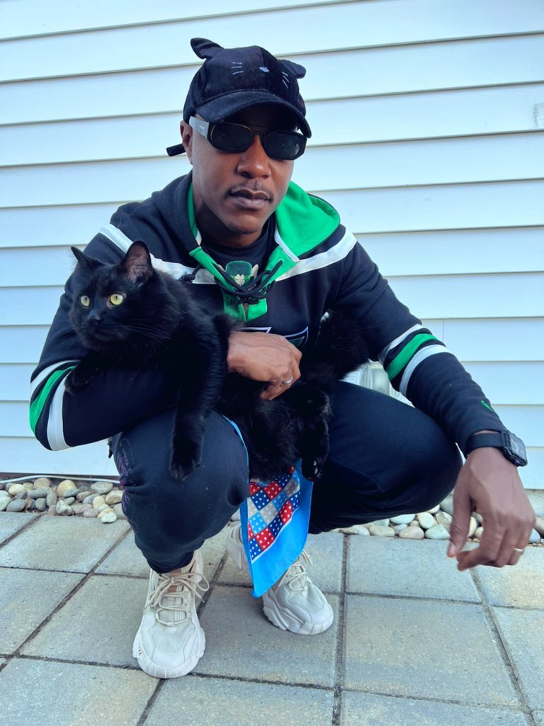 iammoshow's tweet photo. Happy National Black Cat Day from me and Black Savage. Retweet if we had a shot at being your homies just based off this picture 😸🌎🖤#NationalBlackCatAppreciationDay https://t.co/28HBOduJJg