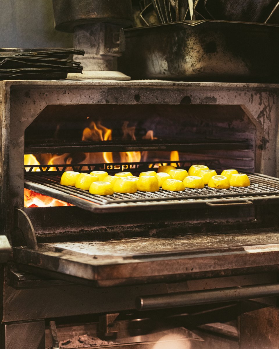 Nothing escapes the fire… 🔥

We charcoal-grill our lemons to bring out their citrus kick; you’ll notice the difference. Served with every market fish, find out today's catch with a reservation today 💥