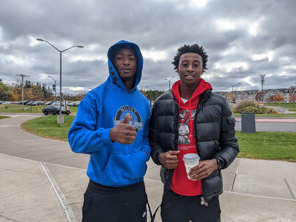 jules_struck's tweet photo. @OnondagaCC students Tashawn Folks (left) and MJ Thomas showed up to hear Biden speak in #Syracuse today. Biden's doing ok, they said. "He's not worse than Trump," said Folks. Top of mind for students like him are stimulus checks and student loan forgiveness, they said. #Biden https://t.co/AxQ7h1LmLg