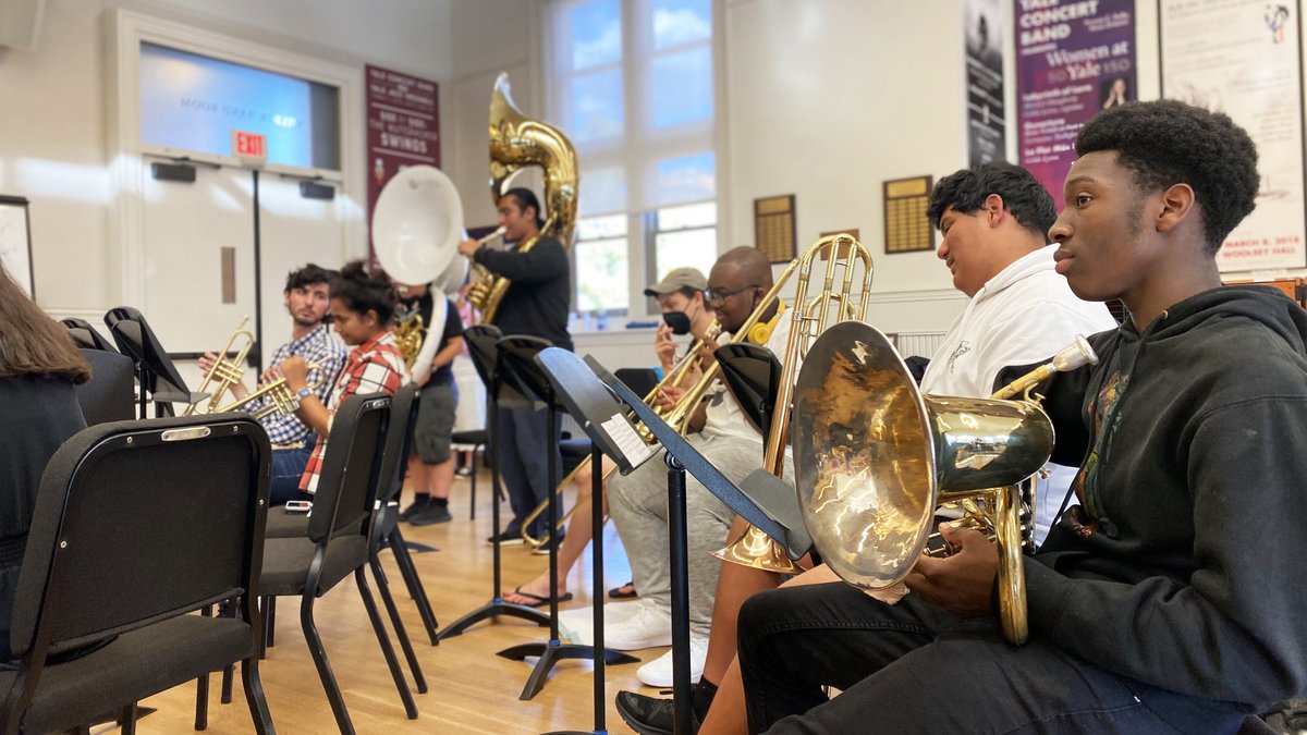 YaleYPMB's tweet photo. The YPMB started off the year strong taking advantage of the pre-season to practice their music in the b'room and their formations on the field in anticipation of football season 🏈💙🤍 #yale https://t.co/xMARBZh4q9