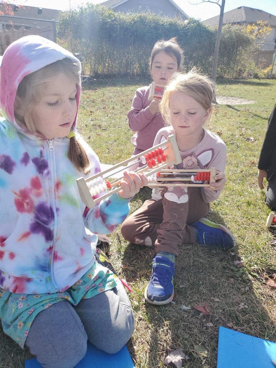Outdoor math class today! Writing and reflecting about the math we see around us. Led to a beautiful conversation. Little ones have the best math brains! So many connections! 
What's my 10? With the rekenreks, too!