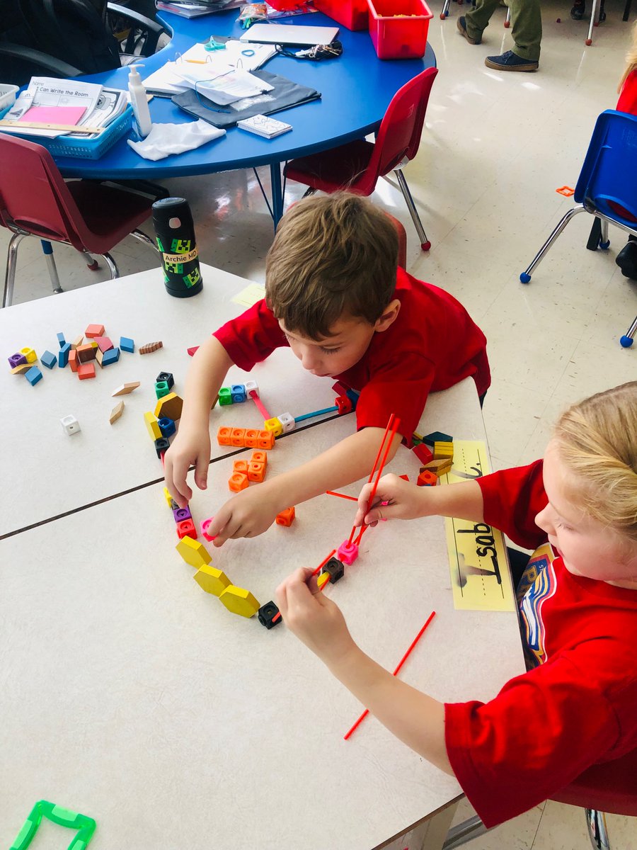 Four Jack-O-Lanterns ready for Halloween 🎃 collecting leaves, carving pumpkins, building a fence for Jasper Rabbit, and Halloween write the room in Kindergarten this week!