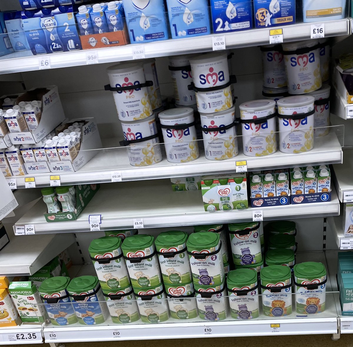 HorsfallKaitlin's tweet photo. In Tesco today, every tub of baby milk was security protected. Yet the alcohol isle had plenty of un-tagged items. Why do I find this really fucking sad?… #CostOfLivingCrisis https://t.co/GoG4q1eGSL