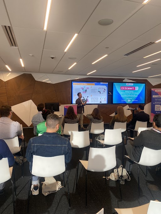 TaskUs's tweet photo. Happening now: Carey Willson talks about A Balancing Act: Building an Optimized Blueprint for Cost Savings and Investments at the CX Summit 2022! #TaskUsCXSummit https://t.co/hJBLa3gY25