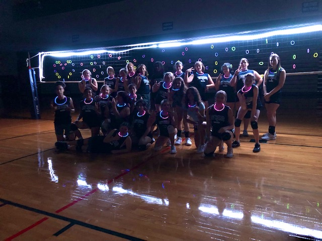 Volleyball is GLOWING!!  Cool practice this morning in neon!
