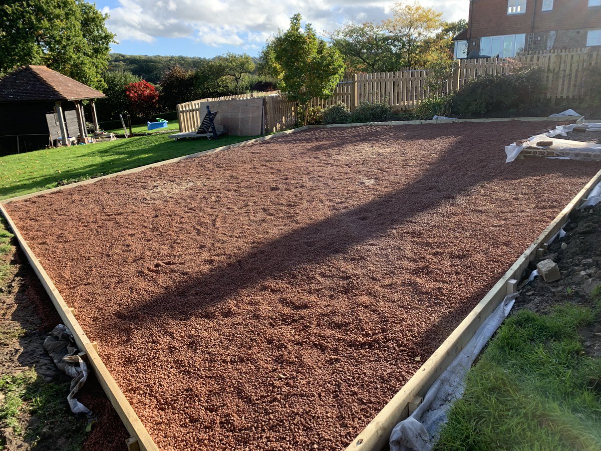 Large area prepared for new raised beds with crushed brick for drainage and 6x2 edging soon to have raised beds, picket fencing surround and pathways created.