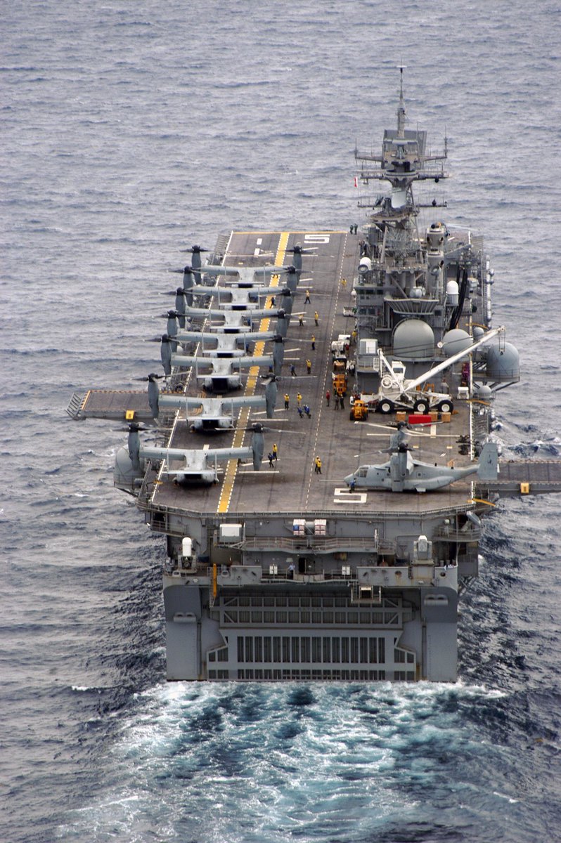 Boneyardsafari's tweet photo. Now that’s a gaggle of Osprey’s on board USS BATAAN (LHD 5). Flash back to 2005 when VMX-22 had eight MV-22’s aboard her for operational testing and evaluation. #navycarriercentennial #vmx22 #mv22 #lhd5 #ussbataan #aviationsafari #aviationpreservation #boneyardsafari https://t.co/CtuNG4bydE