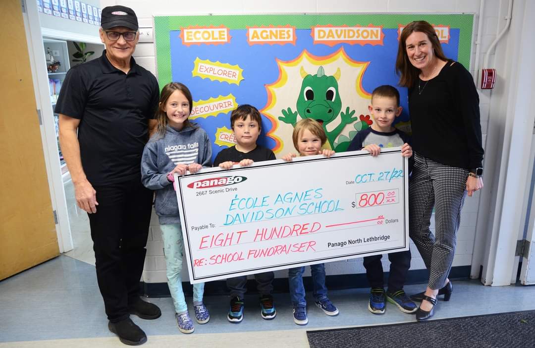 Earlier today, Panago Pizza North stopped by École Agnes Davidson to present an $800 cheque as a result of a successful fundraiser on Oct. 24-25. The school is looking to invest the money into improving its outdoor play space.